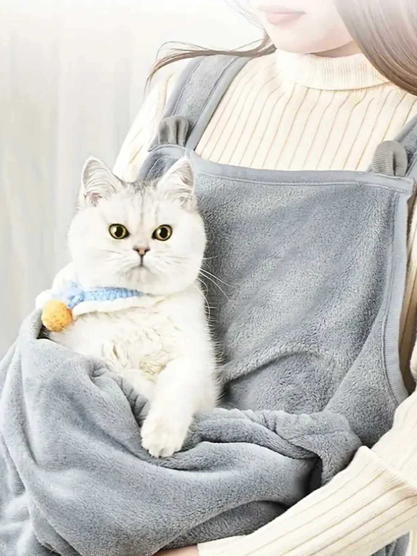 Couchage pour chat tablier pour symbiose avec son humain